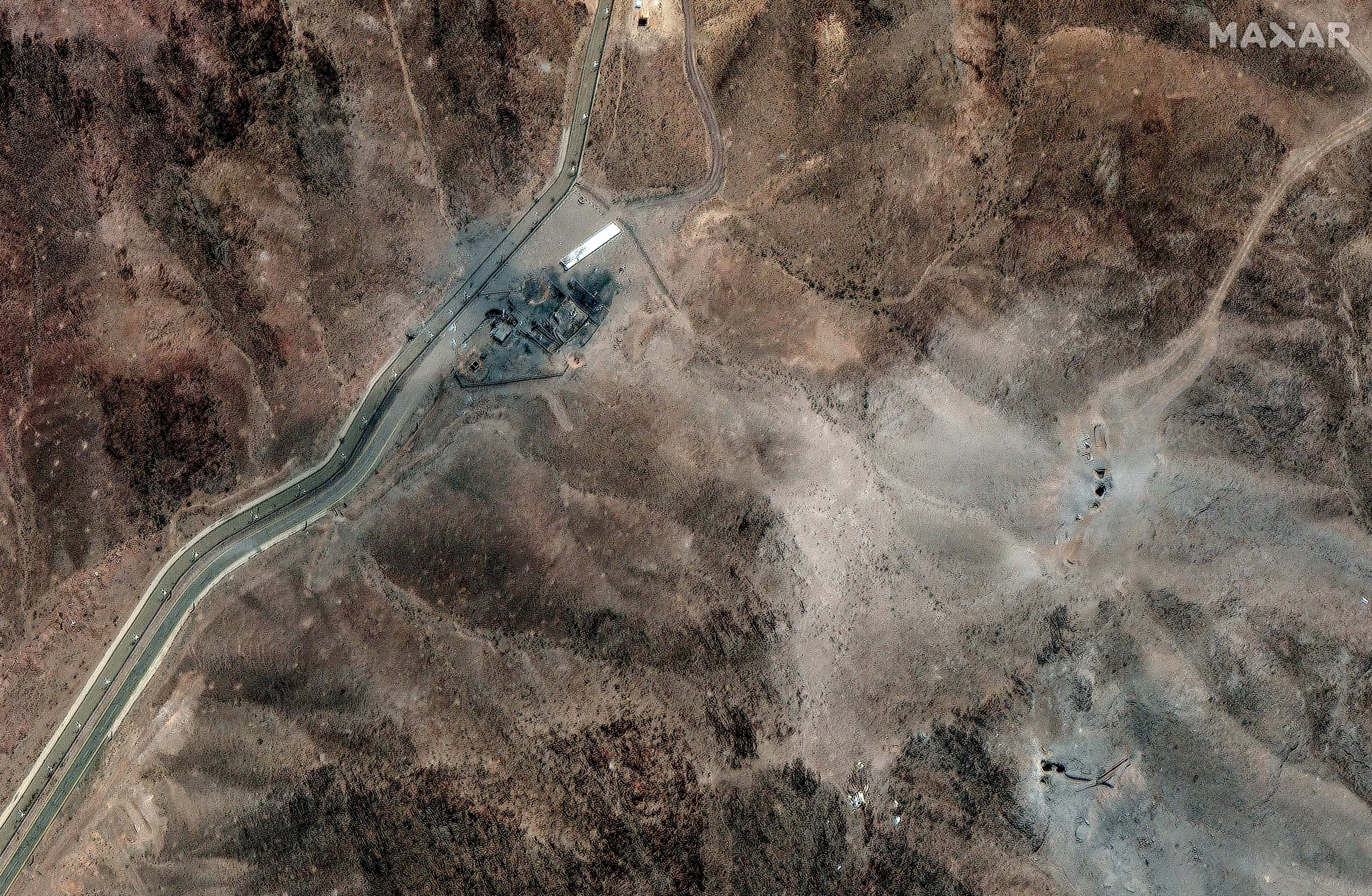 Cơ sở hạt nhân Fordow của Iran bị Mỹ không kích vào tuần trước. Ảnh: Reuters/Maxar.
